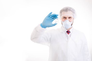 Cheerful Doctor Demonstrating an Antivirus Vaccine Bottle