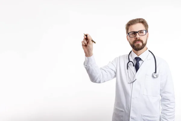 Pensive Physician in Glasses with Stethoscope Writing in Air — стоковое фото