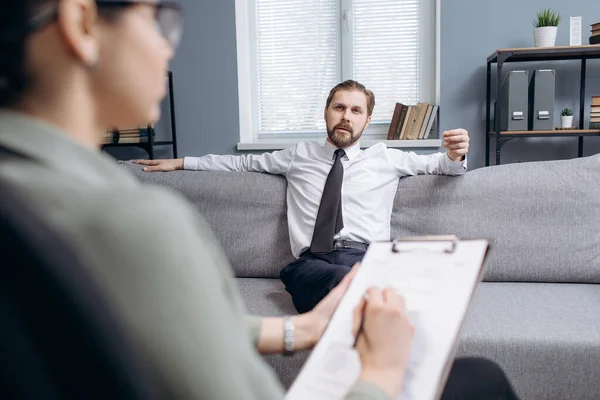 Mature man visiting doctor to deal with mental problems — Stock Photo, Image