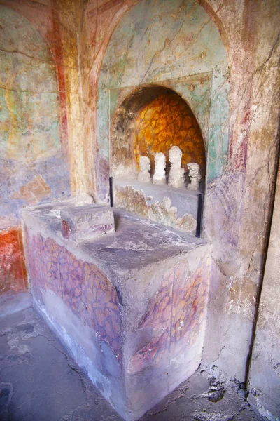 Home altar for the worship of the Roman gods in Pompeii. Selective focus