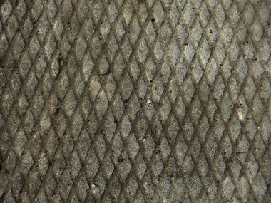 Beton yüzeydeki ince ızgaranın dokusu