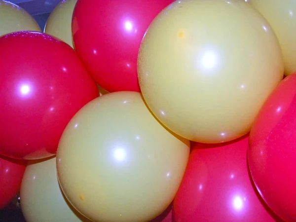 yellow and pink balloons for holiday