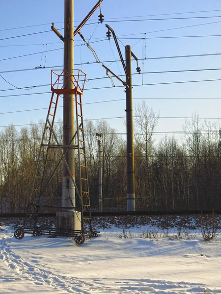 railway tower for wire maintenance in winter