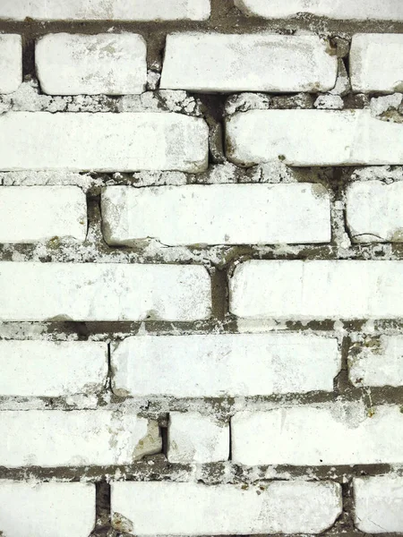 texture of rough white rectangular bricks