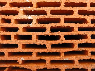 Delikli kırmızı bina tuğlası, arkaplan dokusu