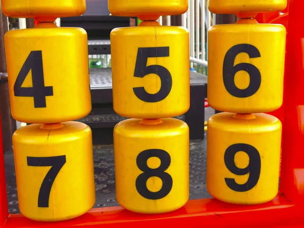 Plastic Educational Numbers Outdoor Playground Yellow Bobbins Black Numbers — Stock Photo, Image