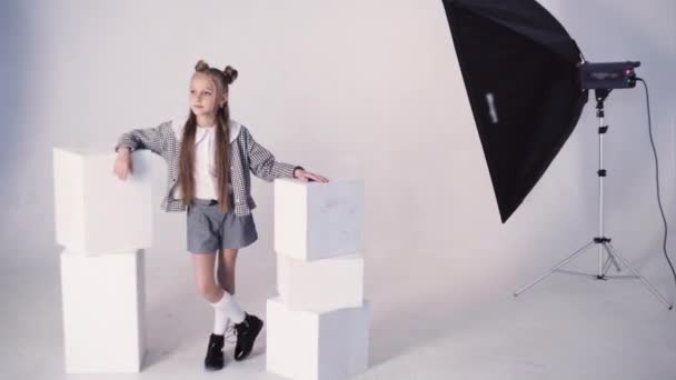 Girl posing on white background — Stock Video