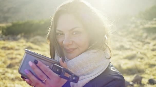 Closeup portrait of a relaxed woman drinking tea — Stock Video