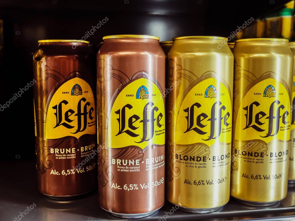 Charleroi, Belgium - December 28 2019 : Leffe Blonde and brown belgian beer cans in a grocery store