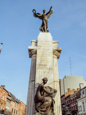 Charleroi, Belgium - December 28 2019 : Monument aux martyrs, mmorial, sculpture en bronze et en pierre par mile Devreux  et Jules Lagae dans un style noclassique et dorique en 1923