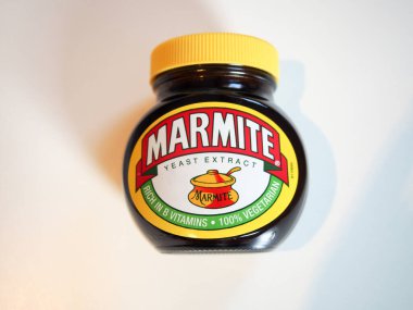 Marmite jar. Marmite is a British brand of yeast extract spread. It is also a source of folic acid  clipart