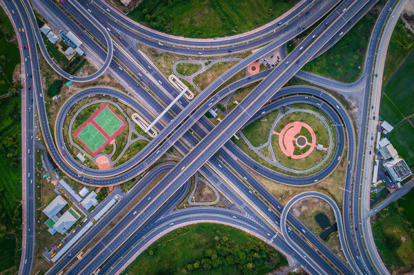 Aerial view Road roundabout with car lots in the city in Thailan