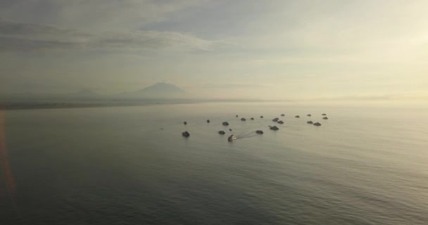 Aerial view of boats and volcano Agung in background — Stock Video