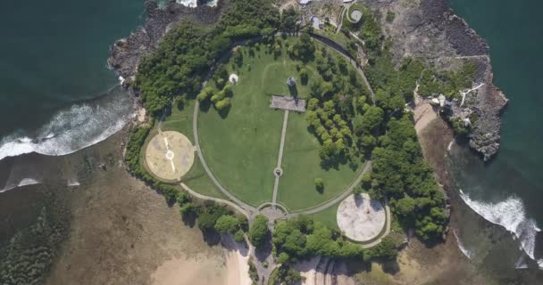 Aerial view of path and buildings at ocean coastline — Stock Video