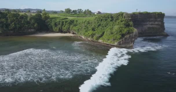 Aerial view of surfers at Balangan beach — Stock Video