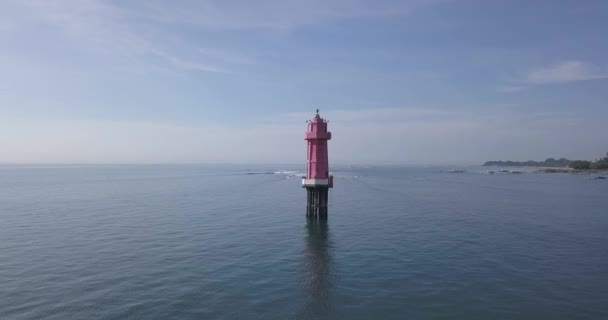 Aerial view of lighthouse in ocean — Stock Video