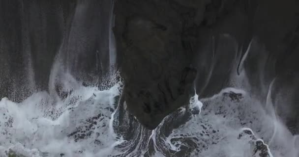 Aerial view of rock in an ocean — Stock Video