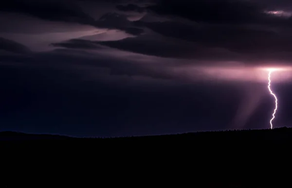 Dark Sunrise Storm Clouds Lighting Bolt Striking Mountains — Free Stock Photo