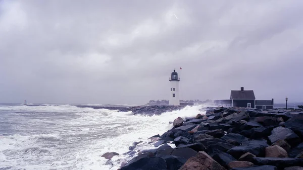Scituate lighthouse and the jetty on a rainy day — Stock Photo, Image