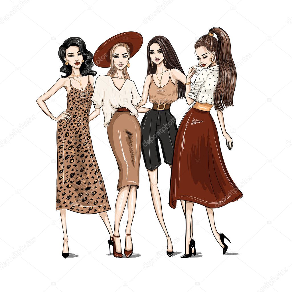 Four young women dressed in trendy clothes