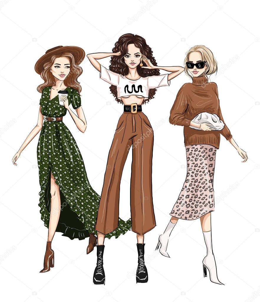 three stylish women in trendy outfits fashion
