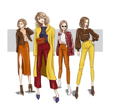 four bright girls models in trendy outfits