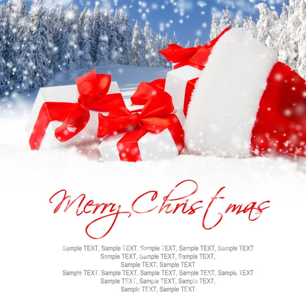Santa mössa med gåvor — Stockfoto