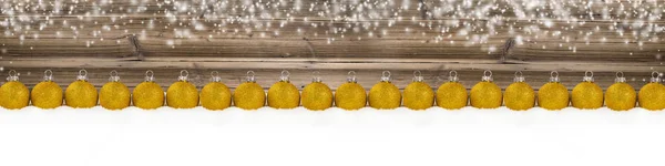 Golden Christmas Ball Row Fondo de madera —  Fotos de Stock