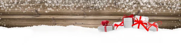 Group of Gifts with Red Ribbons on Wooden Background — Stock Photo, Image