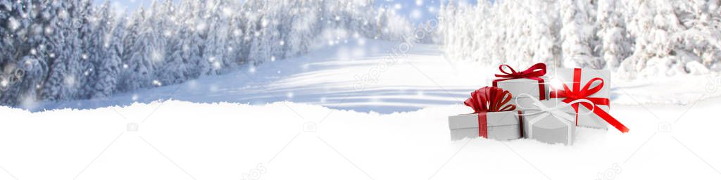 Group of Gifts with Red Ribbons on Winter Forest Background