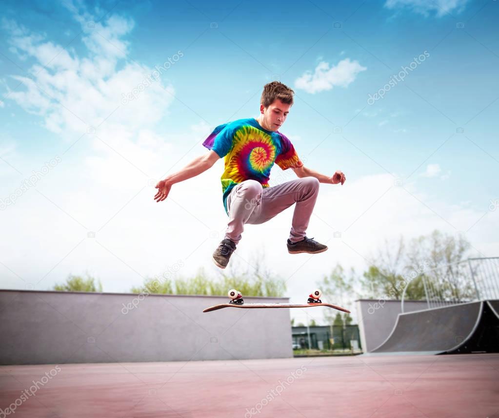 Skateboarder doing kickflip