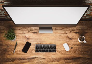 Masasında klavye olan boş ekranlı bilgisayar