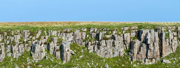 Layer of igneous rocks in the Isle of Skye, Scotland