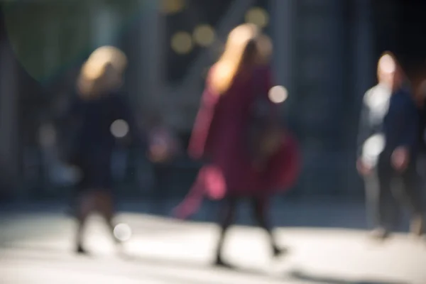 Blurred image of walking business people in the City of London. UK — Stock Photo, Image