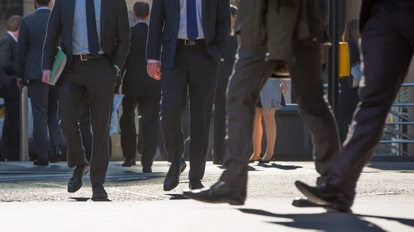 Feet of walking business people in the City of London. Busy modern life concept. — Stock Photo, Image