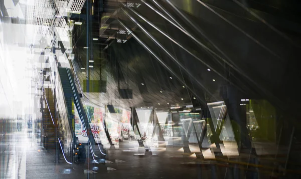 Modern architecture, Train station with escalators, supportive metal beams, tickets machine. Multiple exposure image — Stock Photo, Image