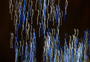 Arka plan Christmas lights uzun pozlama ile yapılmış. Görüntü arka plan veya fotoğraf manipülasyon için