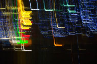 Arka plan Christmas lights uzun pozlama ile yapılmış. Görüntü arka plan veya fotoğraf manipülasyon için