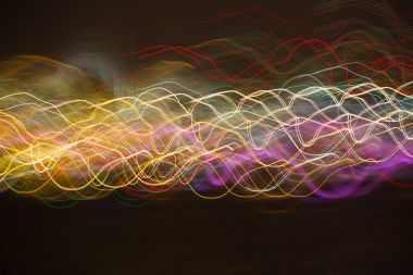 Arka plan Christmas lights uzun pozlama ile yapılmış. Görüntü arka plan veya fotoğraf manipülasyon için