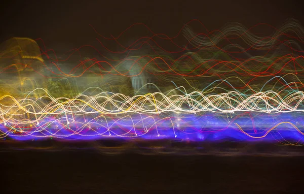 Abstract background made of Christmas lights with long exposure. Image for background or photo manipulations