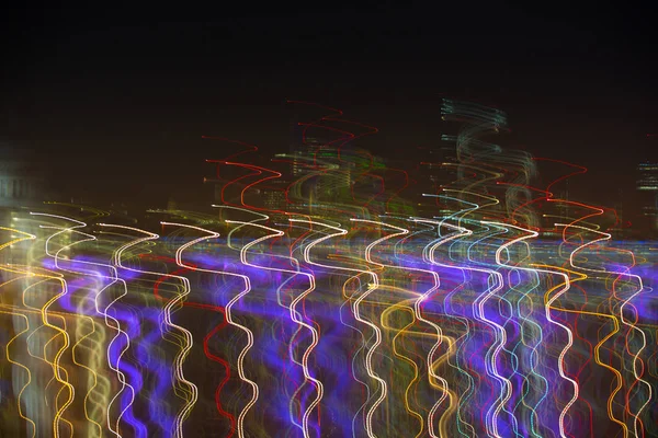 Abstract background made of Christmas lights with long exposure. Image for background or photo manipulations