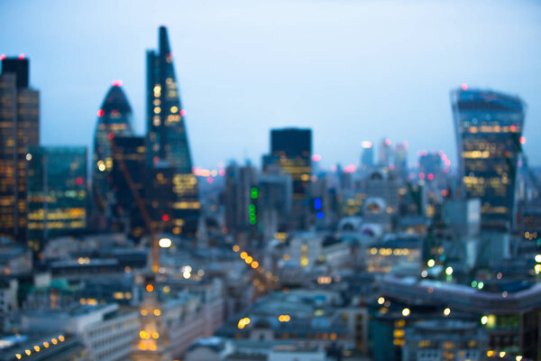 Night city of London view in blur. City street blurry photo, bokeh image. UK London