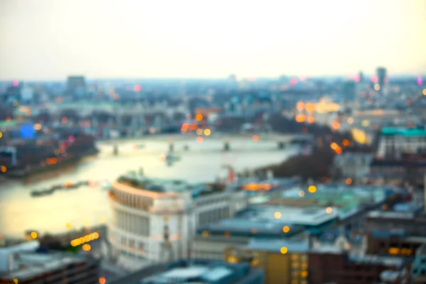 Night city of London view in blur. City street blurry photo, bokeh image. UK London