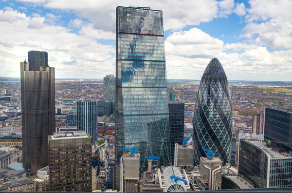 LONDON, UK - APRIL 22, 2017: City of London office buildings. Panoramic view from the 32 floor of London's skyscraper