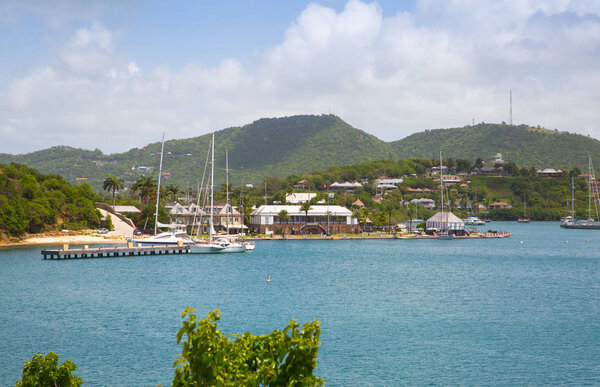 Antigua, Caribbean islands, English Harbour - May 20, 2017: Freeman's bay view with youths