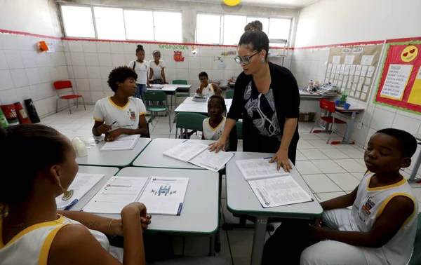 public school teacher and students