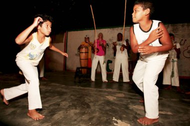 eunapolis, bahia / brazil - april 28, 2010: people are seen playing capoeira in a non-governmental organization in the city of Eunapolis.
