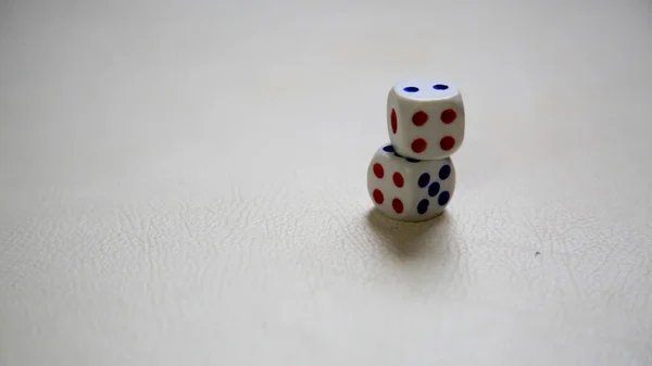 salvador, bahia / brazil - may 12, 2020: dice cube, object used in games of chance. *** Local Caption ***