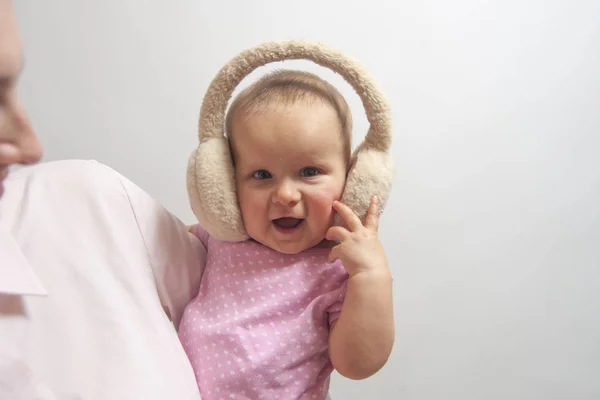 Infant Baby Girl Winter Headphones Mum Hands White Background — Stock Photo, Image