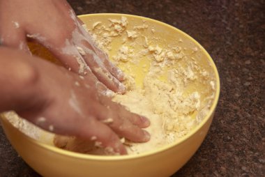 Process of making homemade biscuits - step of making dought.
